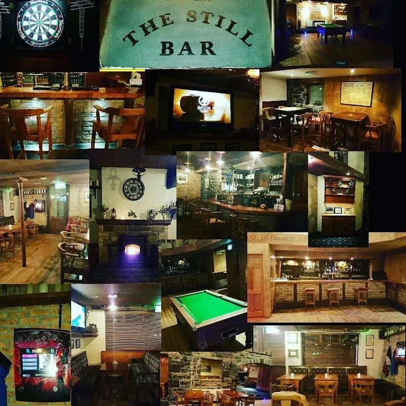 The Still Bar at The Castle Inn showing pool table, darts, stone walls, and fireplace